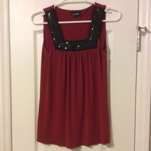 Red blouse with glitter accent